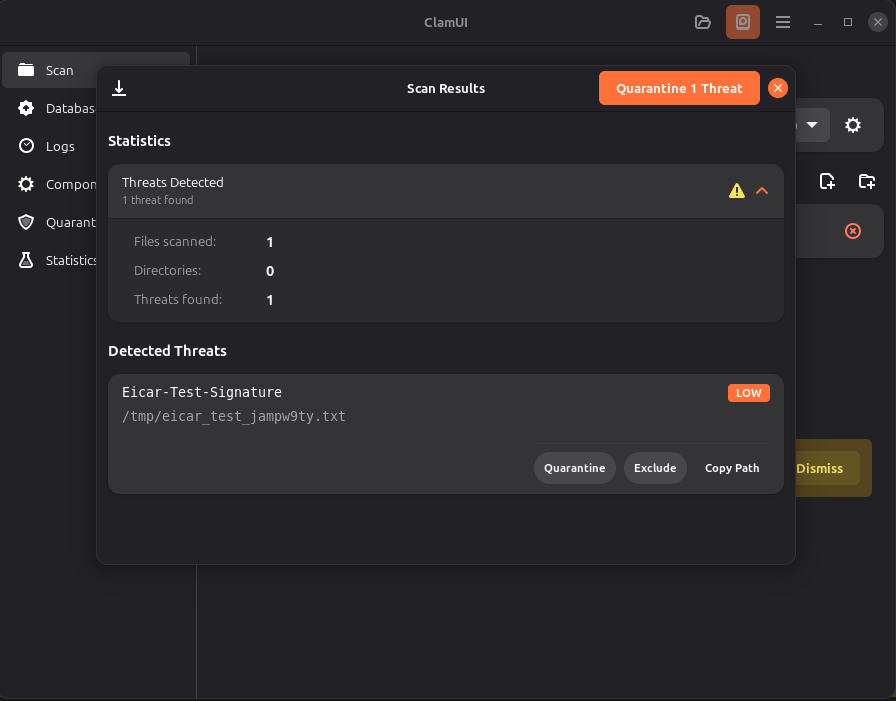 ClamUI showing a completed scan with one detected threat